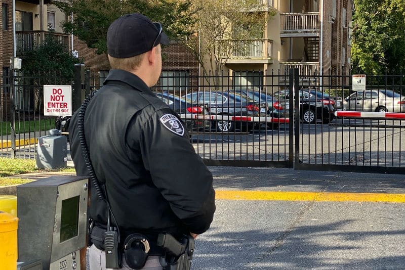 security guard monitoring a parking lot