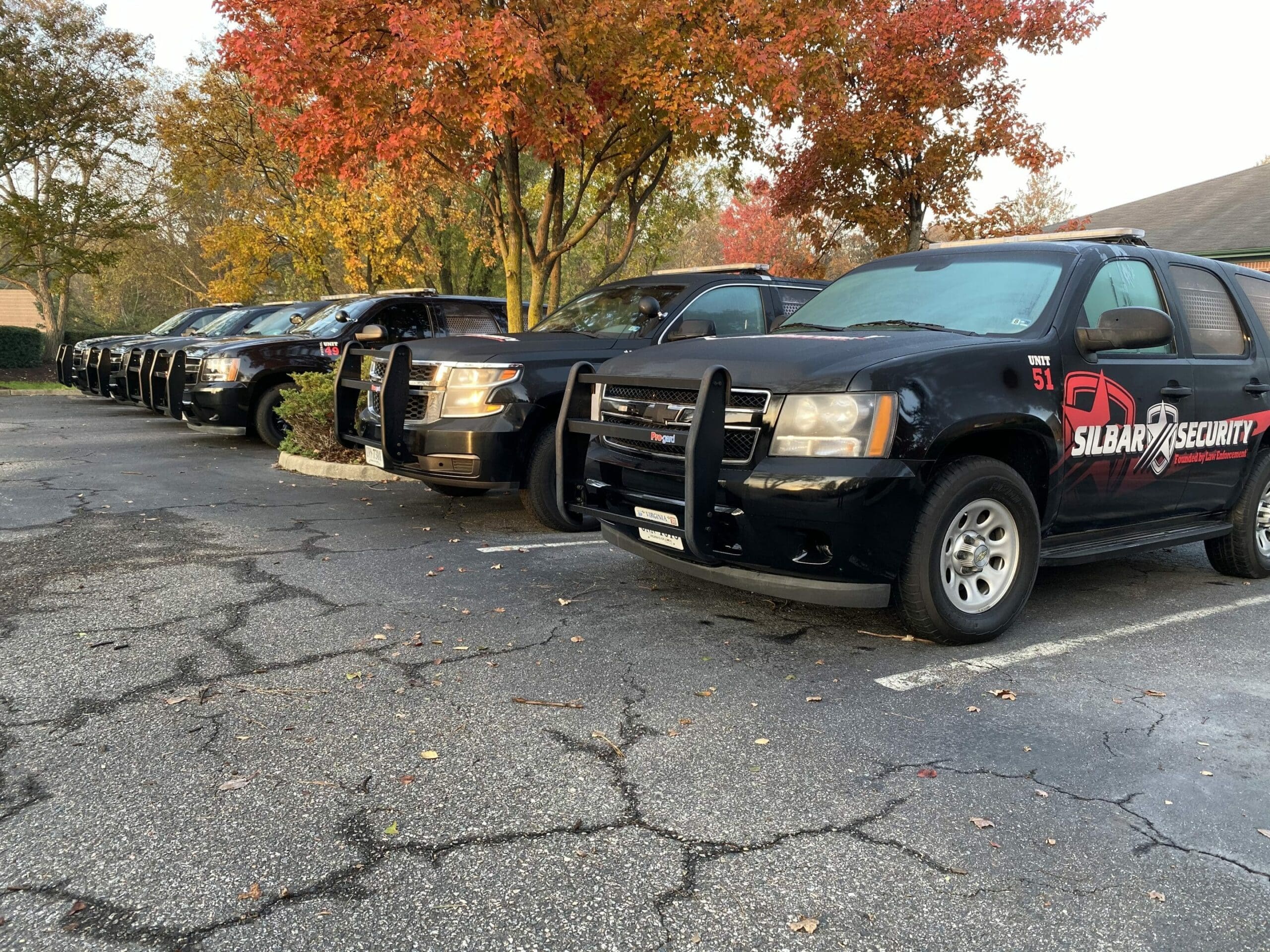 Security patrol vehicles in parking lot