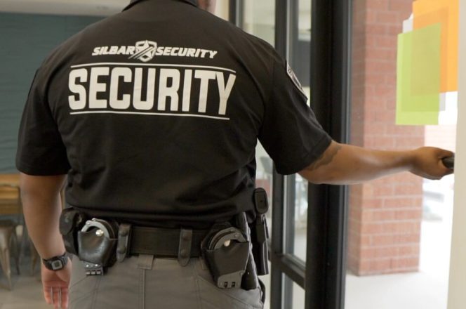 silbar security guard opening a door